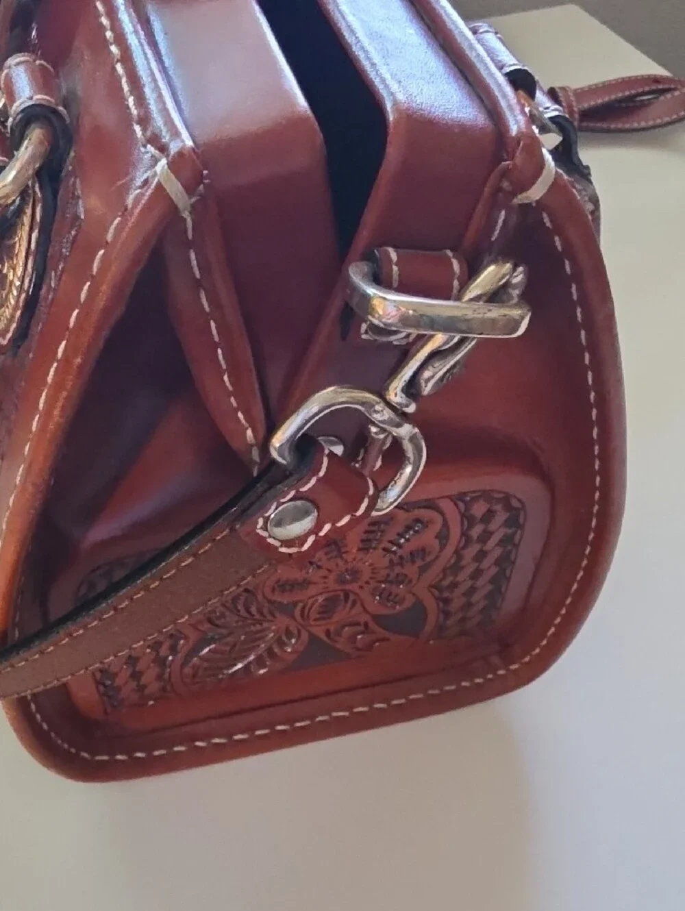 Women’s Tooled Leather Crossbody Bag in Saddle Brown with Silver Buckle